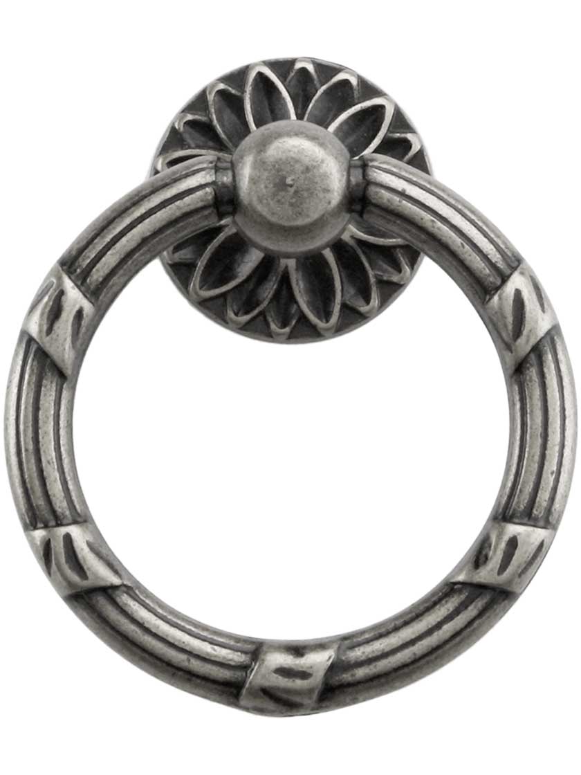 Ribbon and Reed Ring Pull With Flower Motif